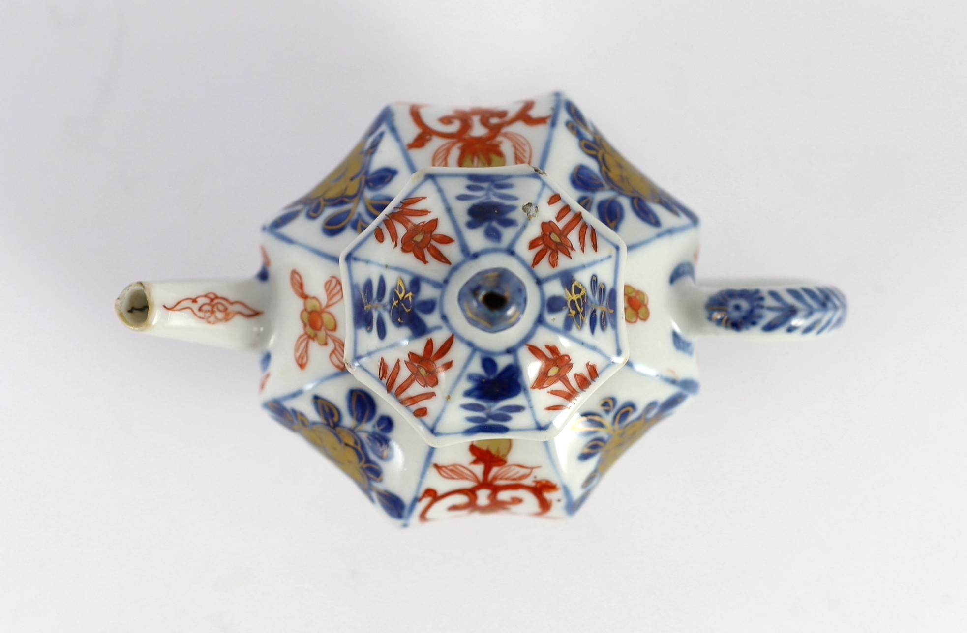 A small Chinese Imari octagonal teapot, Kangxi period, 10 cms high, 10.2 cm high, Rim chips